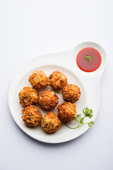 Crispy Noodles/maggie Pakora or pakoda is a popular indochinese street food served with ketchup