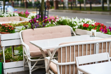 Empty outdoor cafe terrace in the city street
