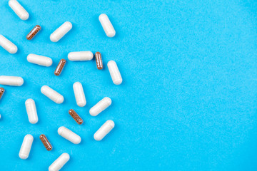 Tablets medicaments on a blue background