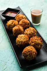 Crispy Noodles/maggie Pakora or pakoda is a popular indochinese street food served with ketchup