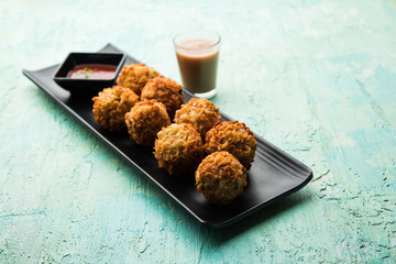 Crispy Noodles/maggie Pakora or pakoda is a popular indochinese street food served with ketchup