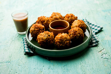 Crispy Noodles/maggie Pakora or pakoda is a popular indochinese street food served with ketchup