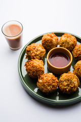 Crispy Noodles/maggie Pakora or pakoda is a popular indochinese street food served with ketchup