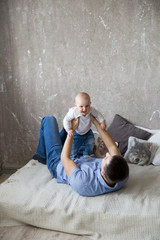 Caucasian Father and Daughter Lying on Bed