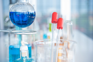 Test tube and scientist equipment in modern science laboratory