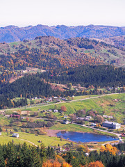 Carpatian village at mountains at the sunny day