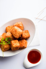 Crispy Paneer popcorn is a popular party snack and an appetiser. selective focus