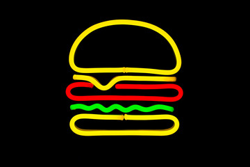 Glowing neon burger sign on isolated black background. Bar. Neon concept. Modern style. Neon sign.