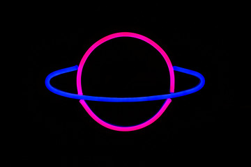 A bright glowing neon sign of Saturn isolated on black background. Neon concept. Modern style. Neon...