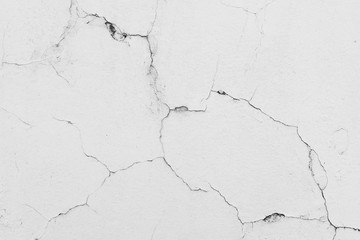 white cement wall with crack
