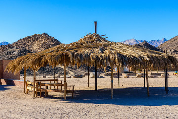 Bedouin building of palm twigs in a desert not far from Hurghada city, Egypt