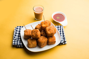 Crispy Paneer popcorn is a popular party snack and an appetiser. selective focus