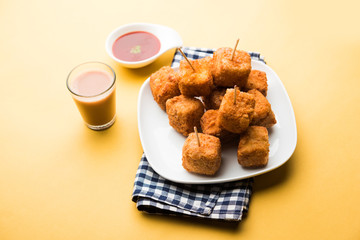 Crispy Paneer popcorn is a popular party snack and an appetiser. selective focus