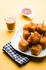Crispy Paneer popcorn is a popular party snack and an appetiser. selective focus