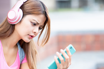 student listen music with phone