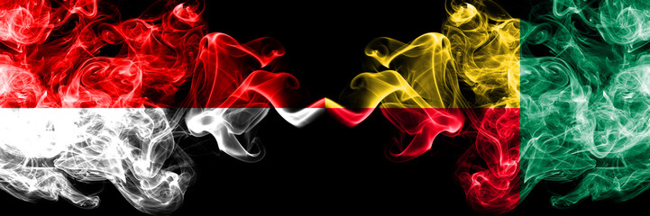 Indonesia vs Benin, Beninese smoky mystic flags placed side by side. Thick colored silky smoke flags of Indonesia and Benin, Beninese