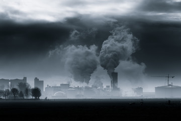 A chemical plant polluting the air and causing rising temperatures and global warming - 278509877