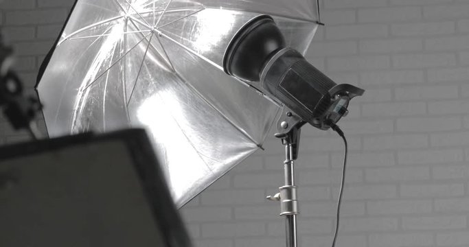 Empty photo studio with umbrella. Close up.