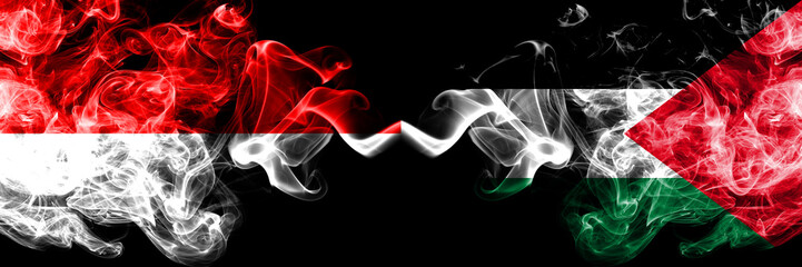 Indonesia vs Palestine, Palestinian smoky mystic flags placed side by side. Thick colored silky smoke flags of Indonesia and Palestine, Palestinian