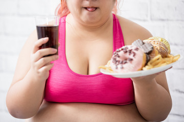 plus size girl with dessert