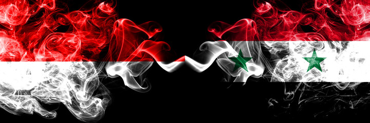 Indonesia vs Syria, Syrian smoky mystic flags placed side by side. Thick colored silky smoke flags of Indonesia and Syria, Syrian