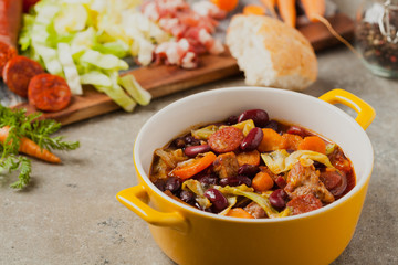 Traditional portuguese goulash with cabbage, beans and ribs.