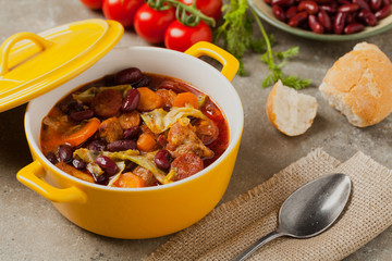 Traditional portuguese goulash with cabbage, beans and ribs.