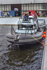 view of a modern military small boat moored in the seaport of the city of St. Petersburg, Russia