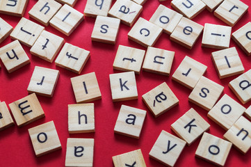 Alphabet letters on wooden scrabble pieces