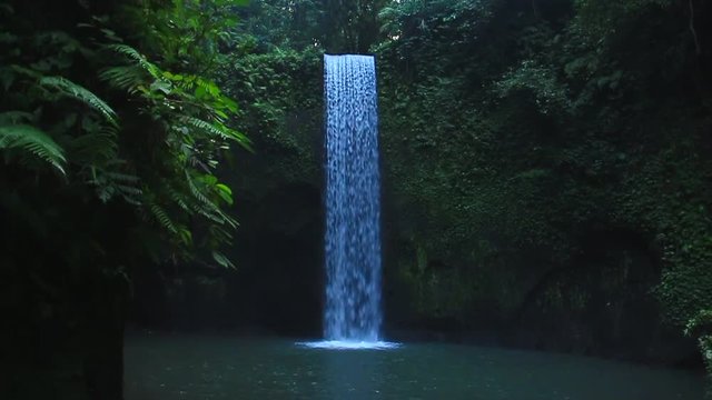 Timbumana Waterfall In A Secluded Jungle With A Perfect Bridal Veil Into A Pool in Ubud, Bali, Indonesia - in Slow Motion