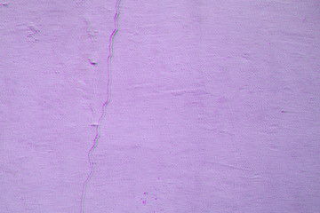 Old purple wall with crack and plaster. textured background. Digital signal  glitch effect (rgb shift, slices). Screen error