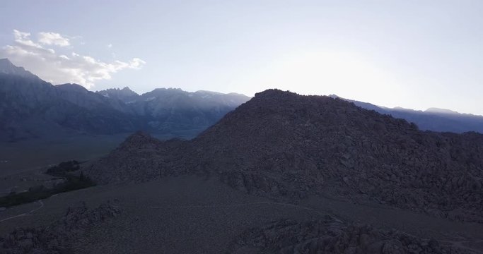 Aerial panoramic shot above alabama hills on early morning. Drone orbiting shot