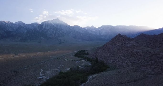 Alabama hills on sunset, aerial dolly in shot over campsite, lone pine, California
