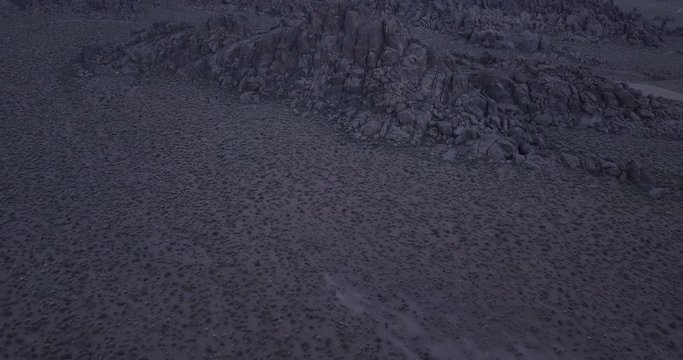 aerial view of Alabama hills drone shot revealing large boulders, Lone pine, California