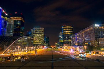 Fototapeta na wymiar Night Pedestrian Square Surrounded by Skyscrapers