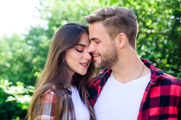honeymoon vacation. man and woman in checkered shirt relax in park. family weekend. romantic date. valentines day. summer camping in forest. hipster couple outdoor. couple in love. Hiking