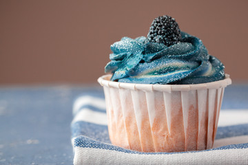 Group of cupcakes on dark background selective focus