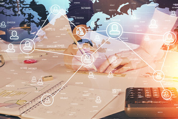 Man's hands working with notes background. Social networking scheme . Mixed media