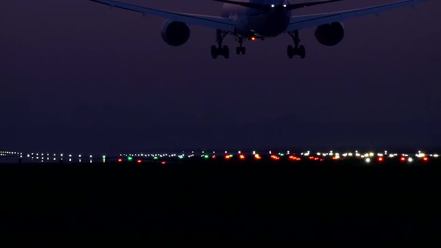 Big airliner landing at night