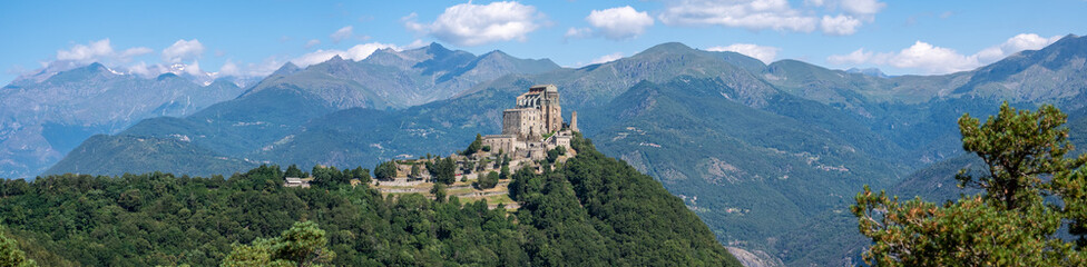 Fototapeta na wymiar Sacra di San Michele or Saint Michael's Abbey and the alps, Piedmont, Italy.