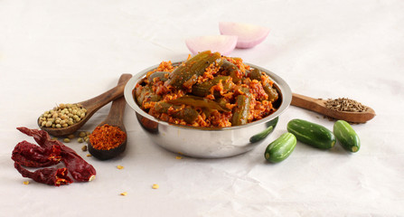 Ivy gourd or tindora curry, an Indian, vegetarian, and healthy side dish, for items like chapati and roti, and its main ingredients.
