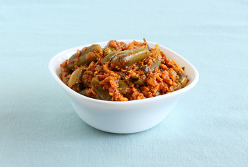 Ivy gourd or tindora curry is an Indian, vegetarian, and healthy side dish for items like chapati and roti.