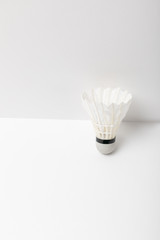 Fototapeta na wymiar white light badminton shuttlecock on white background with copy space