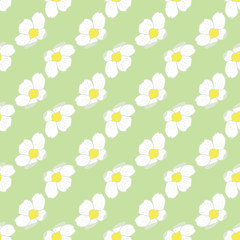 Strawberry blossom in diagonal lines it is a floral vector seamless pattern in pastel green, white and yellow for backgrounds, textile, home decor. Perfect for Spring and Summer projects.