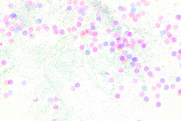 Confetti  on a white background, festive concept.  Perfect place for your design.