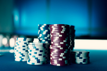 Piles of chips on the poker table