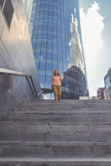 a outside business girl and office with phone notepad and pen