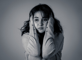 Human expressions and emotions. Young attractive woman with sad and depressed expression