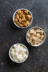 White and brown sugar cubes.