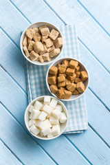 White and brown sugar cubes.